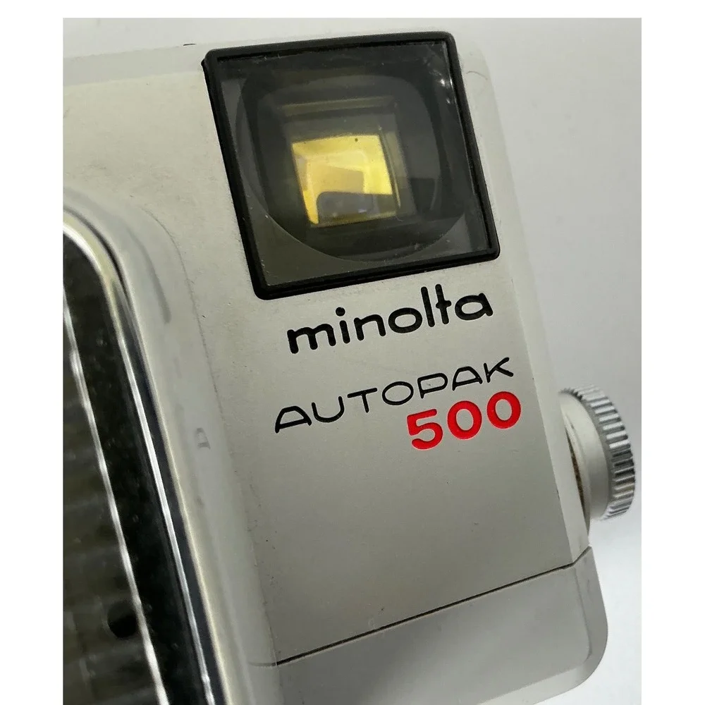 Minolta Vintage Autopak 500 Film Camera Rokkor 38mm f/2.8 Lens Silver Black Retr